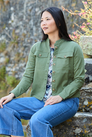 There is so much khaki around this season, you will surely need this short smart casual jacket in your wardrobe to pop on top of summer dresses or to wear with light coloured jeans or denim.&nbsp; The Clovelly is softened by a frill collar and has breast pockets, side pockets, a pleat in the back and really nice buttons.