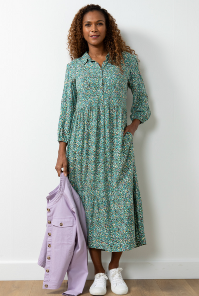 <p data-mce-fragment="1">Get ready to rock the summer in our Lily &amp; Me Sadie Dress in Terrazzo Green! This playful maxi shirt dress is the perfect addition to your wardrobe. With a fun green terrazzo print, you'll turn heads while staying cool in the heat.&nbsp;</p> <p data-mce-fragment="1">&nbsp;</p> <p data-mce-fragment="1">Made of 100% <span data-mce-fragment="1">Ecovero™ Lenzing™ Viscose, Machine wash at 30°C</span></p>