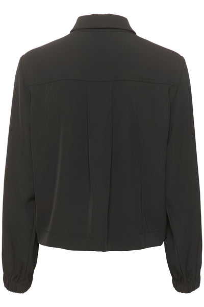 This is a very cool long sleeved, zip up shirt - or is it a jacket?  Anyway it is black and silky with pockets and it will be very welcome in your wardrobe to wear with wide-leg trousers or jeans.  100% Polyester  Machine wash at 30 degrees