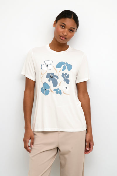 Add some flower power to your wardrobe with KAFFE's Avalentina T-shirt. This basic tee features abstract blue flowers for a playful and unique touch. Perfect for adding a pop of color to any outfit. (Don't worry, no bees were harmed in the making of this t-shirt!)     Made of 95% Viscose & 5% Elastic, wash at 30 degrees and air dry where possible