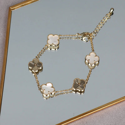 featuring the classic four-leaf clover  Mother of Pearl Bracelet  with Mother of Pearl details  14k gold plated  Please keep dry