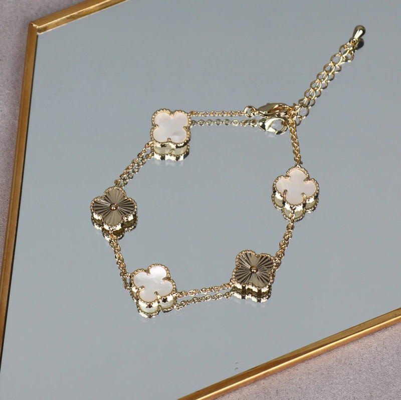 featuring the classic four-leaf clover  Mother of Pearl Bracelet  with Mother of Pearl details  14k gold plated  Please keep dry