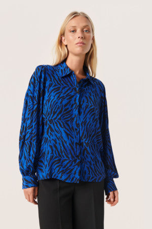 Soaked In Luxury - Chrishell Shirt in Beacoup Blue on a model showing a bfull length view