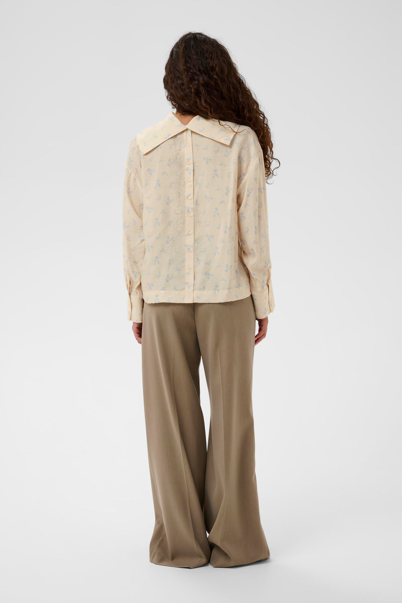 Soaked in Luxury - Eneya Blue Cream Printed Funnel Blouse