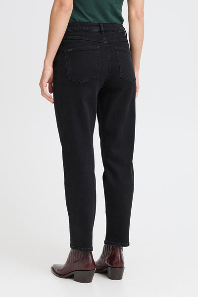 Back view of Person wearing BY Loetta black jeans on a white background