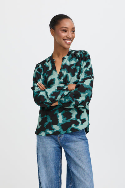 model wearing B Young - Ibine Smock LS Blouse in Blurry Green