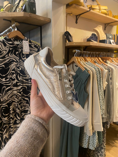 Get ready to shine this summer with our Caprice Rose Gold Trainers! These elegant leather trainers feature gold brushes, a white sole, and laces for a touch of glamour. Whether you're strolling in the summer sun or hitting the streets, these trainers will keep your feet comfortable and stylish. Order now and step into luxury.    Heel Height: 25mm,&nbsp;Shoe Height: 6.5cm  Made of Lining: Synthetic,&nbsp;Upper: Leather,&nbsp;Insole: Leather