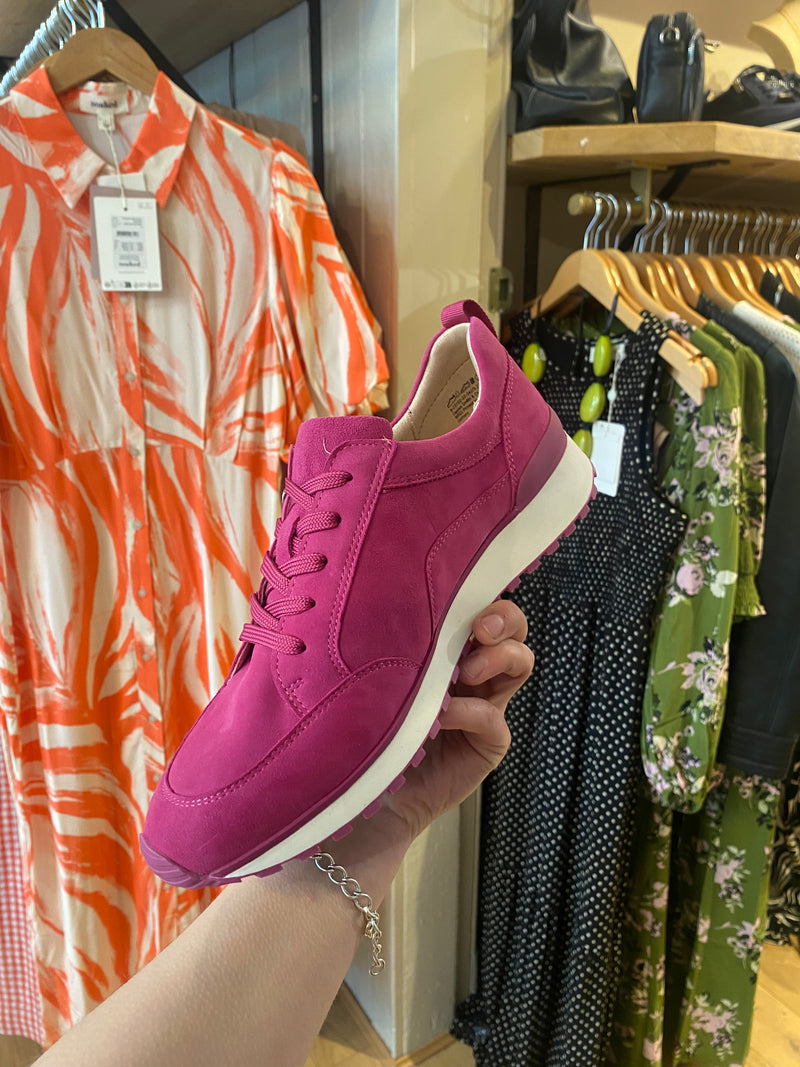 Elevate your style with Caprice Hot Pink Suede Trainers! These fabulous trainers feature a trendy wedge sole that adds a spring to your step all year round. Sporty yet versatile, pair them with jeans or dresses for effortless everyday wear. Don&