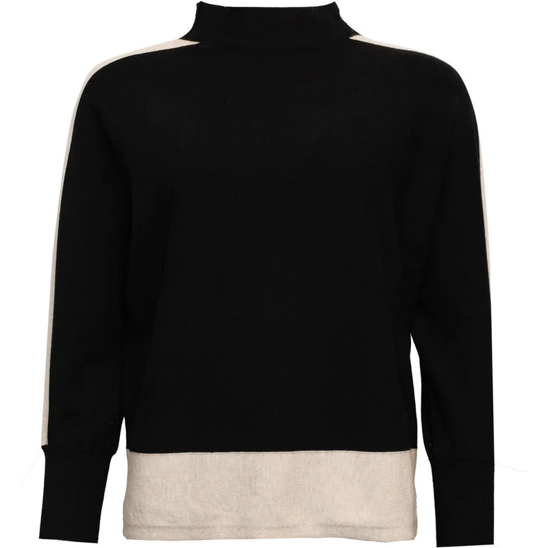 Black turtleneck sweater with cream stripes on sleeve and deep cream hem