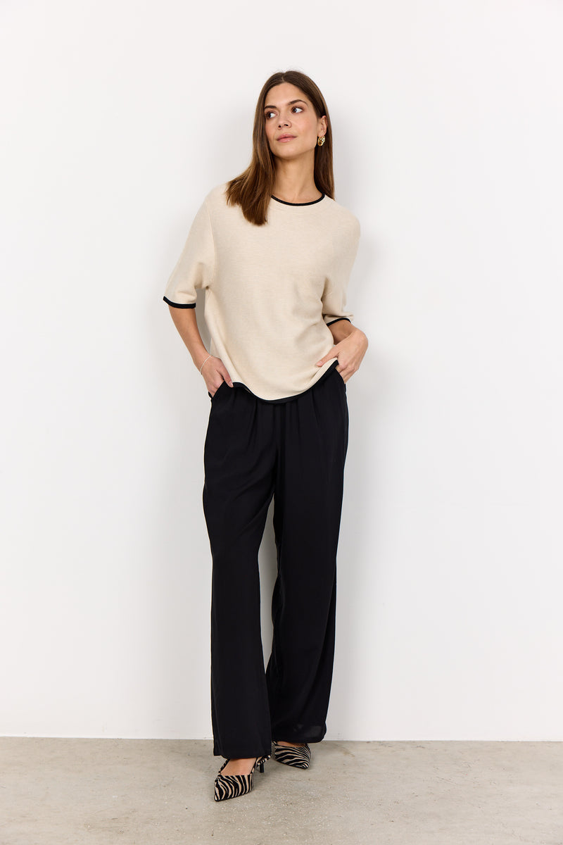 SoyaConcept - Dollie Pullover in Cream on model with black trousers