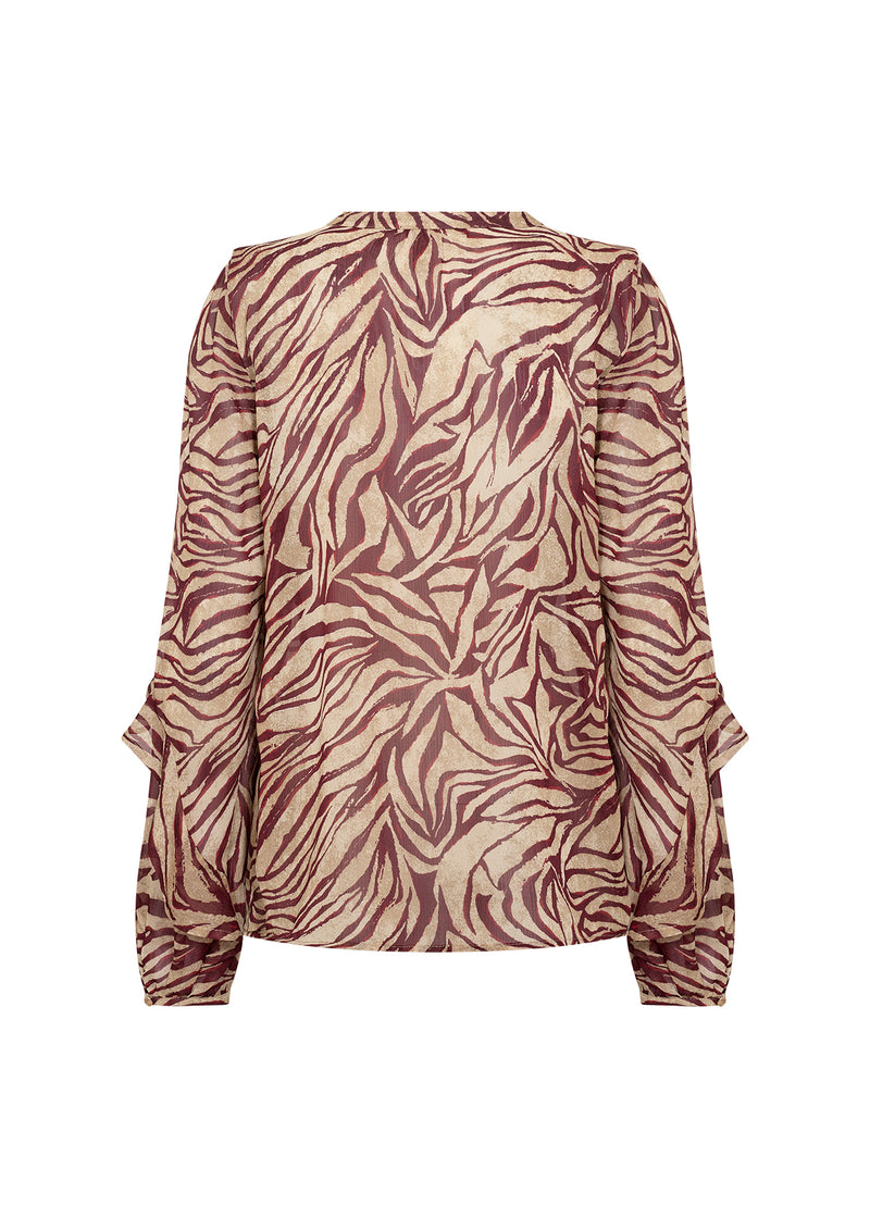Zebra print blouse on a white background