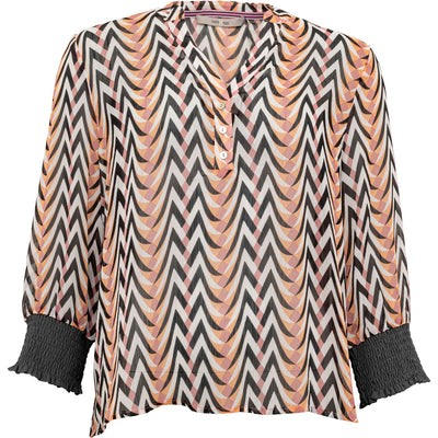 Snap up this incredibly stylish sheer shirt from Costmani. The Waterlilly features a beautifully delicate graphic print in shades of pale tangerine, pink and barely black on off white finished off with Costamani's signature fancy contrast black ruched cuffs and a gorgeous pleated back. Really something a bit different.  100% Polyester.  30 degree machine washable   