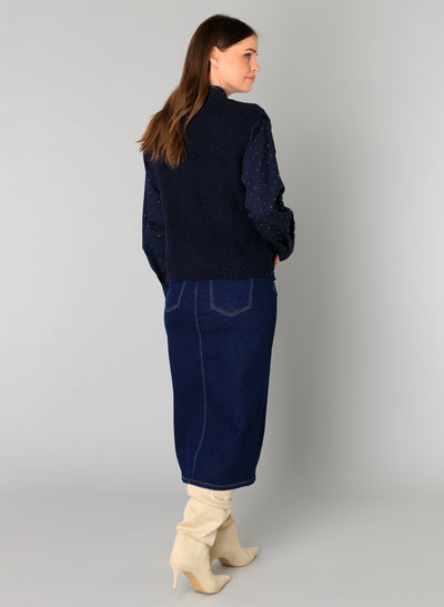 Yest -back view of model wearing Navy Knitted Brenda Gilet with skirt and blouse