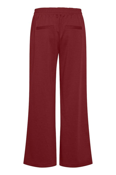 back view burgundy pants on a white background