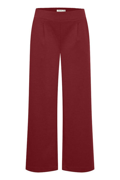 Burgundy pants on a white background
