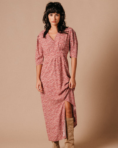 Pretty and playful, this maxi dress will have you feeling like a million bucks! Featuring a feminine print and colouring, short sleeves, and a v-neckline, this dress is perfect for a summer day out. Get ready to turn heads!   Made of 85% viscose and 15% linen, wash at 30 degrees and air dry where possible, low iron if needed