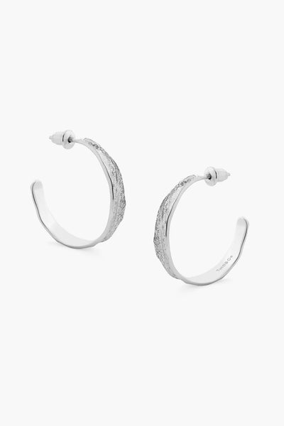 Made with Tutti & Co's signature organic coastal texture, these silver harper hoops are perfect for our silver-loving ladies who love a chunkier statement piece on their ears!      Made from polished brass with 925 silver plating. Precious, enduring metals that won’t tarnish in water, under the sun or over time.